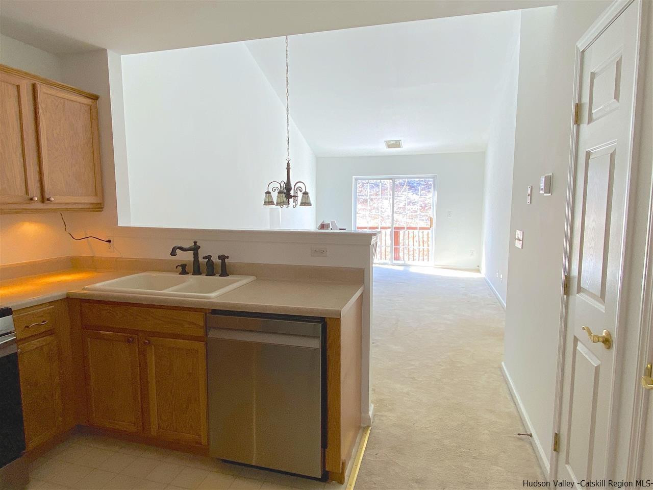 1036 Maggie Road, Unit 148 Newburgh, NY 12550 - Photo 3 of 19 a bathroom with a sink and a mirror
