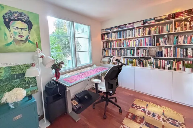 a room with furniture and a book shelf