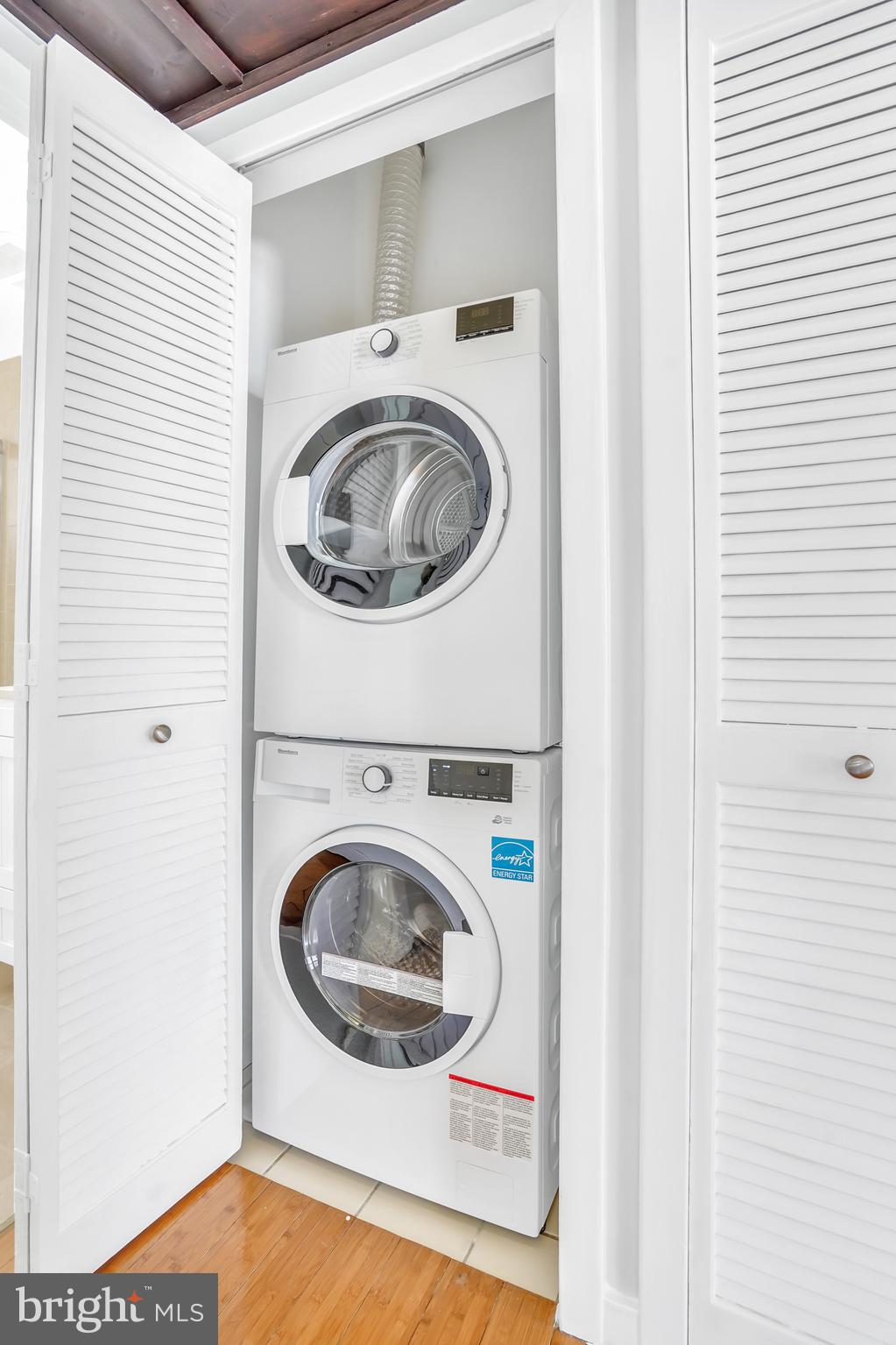 2114 N Street Northwest, Unit 46 Washington, DC 20037 - Photo 24 of 26 a utility room with dryer and washer