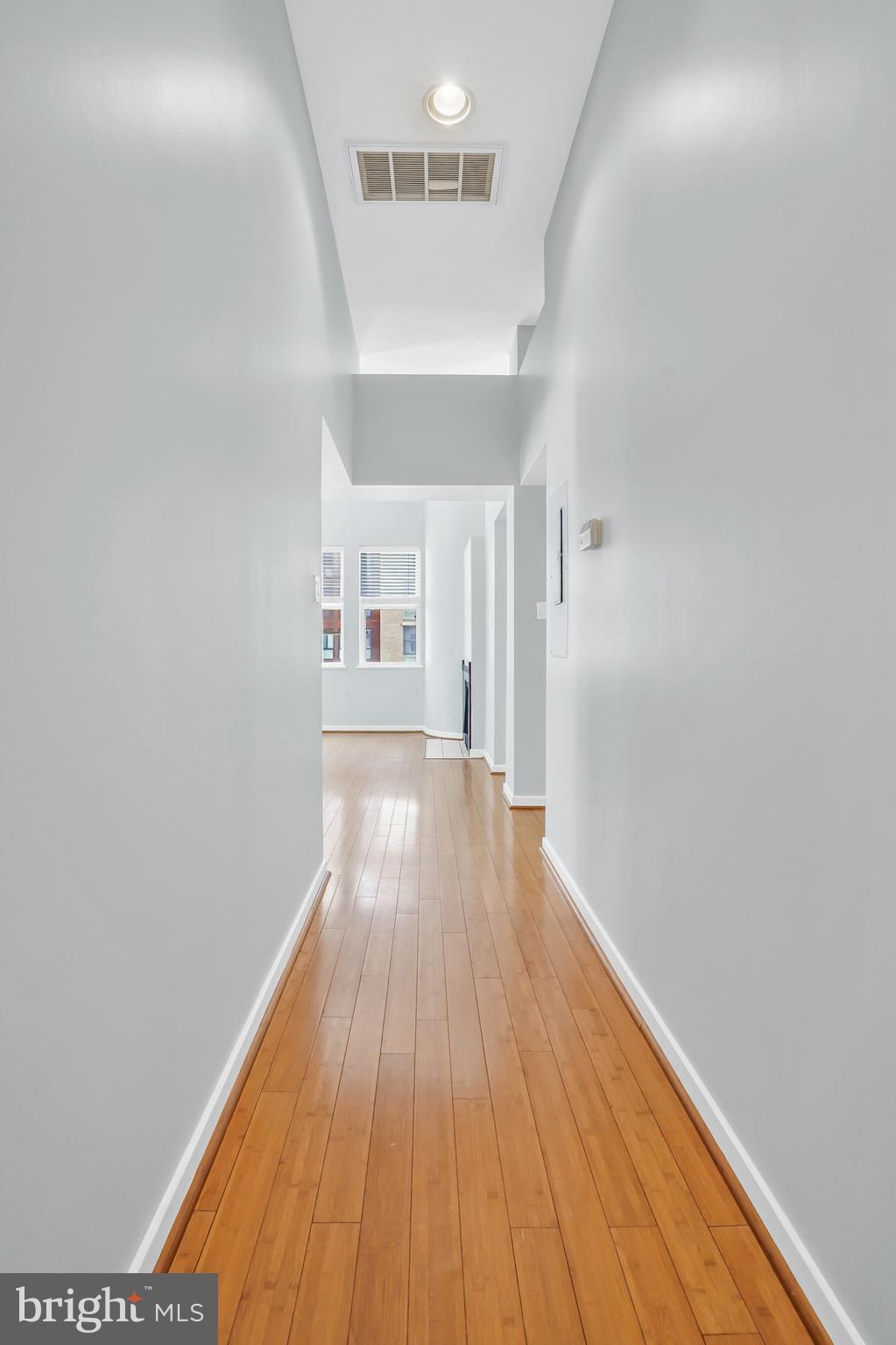 2114 N Street Northwest, Unit 46 Washington, DC 20037 - Photo 5 of 26 a view of a hallway with wooden floor