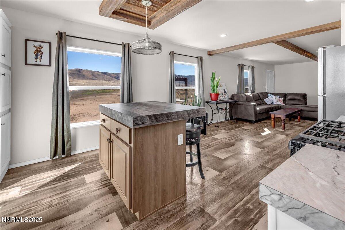 195 Muletail Circle Reno, NV 89508 - Photo 12 of 44 a open kitchen with stainless steel appliances granite countertop a stove and a refrigerator