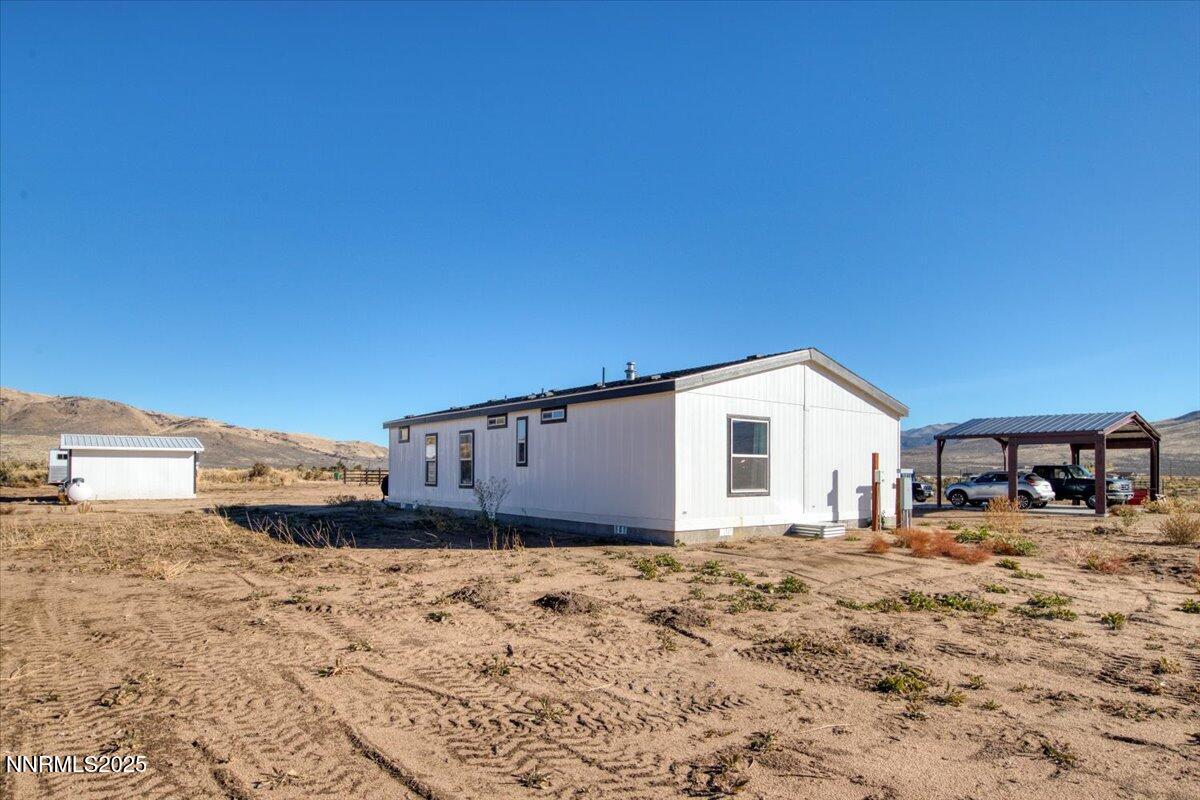 195 Muletail Circle Reno, NV 89508 - Photo 27 of 44 a view of a house with wooden fence
