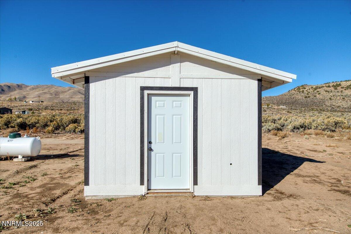 195 Muletail Circle Reno, NV 89508 - Photo 28 of 44 a view of a house with a snow on the wall