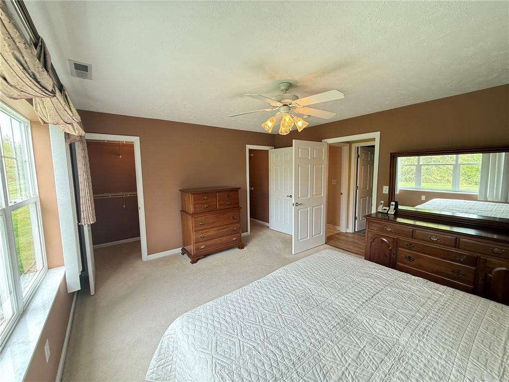 411 Chestnut Lane Apollo, PA 15613 - Photo 8 of 38 a bedroom with a bed dresser and a window