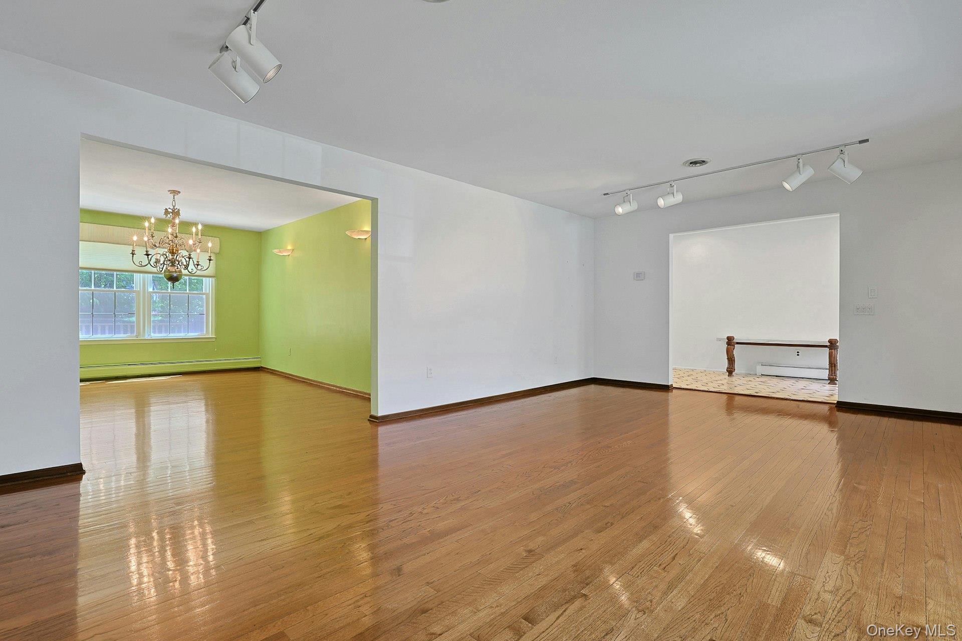 44 Ruth Drive New City, NY 10956 - Photo 6 of 40 LIving room opens to the dining room