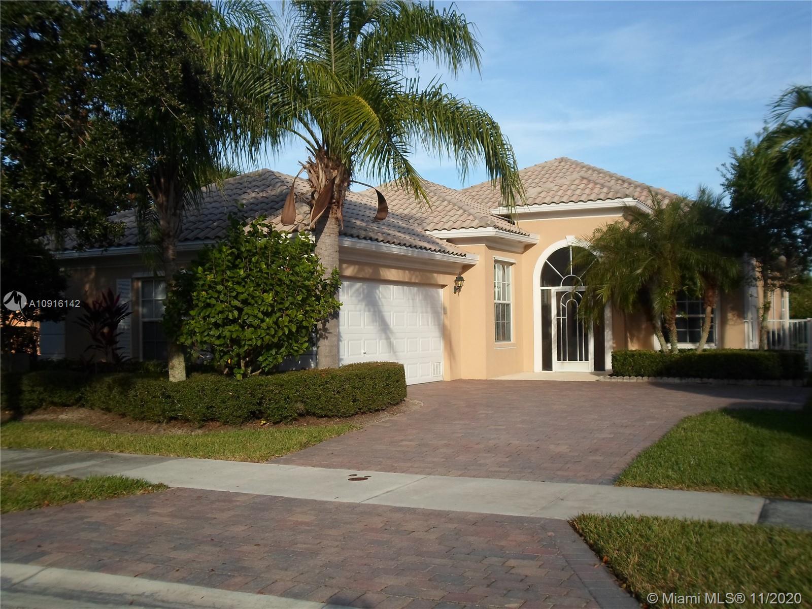 10889 Southwest Candlewood Road Port St. Lucie, FL 34987 - Photo 1 of 13 Front Elevation