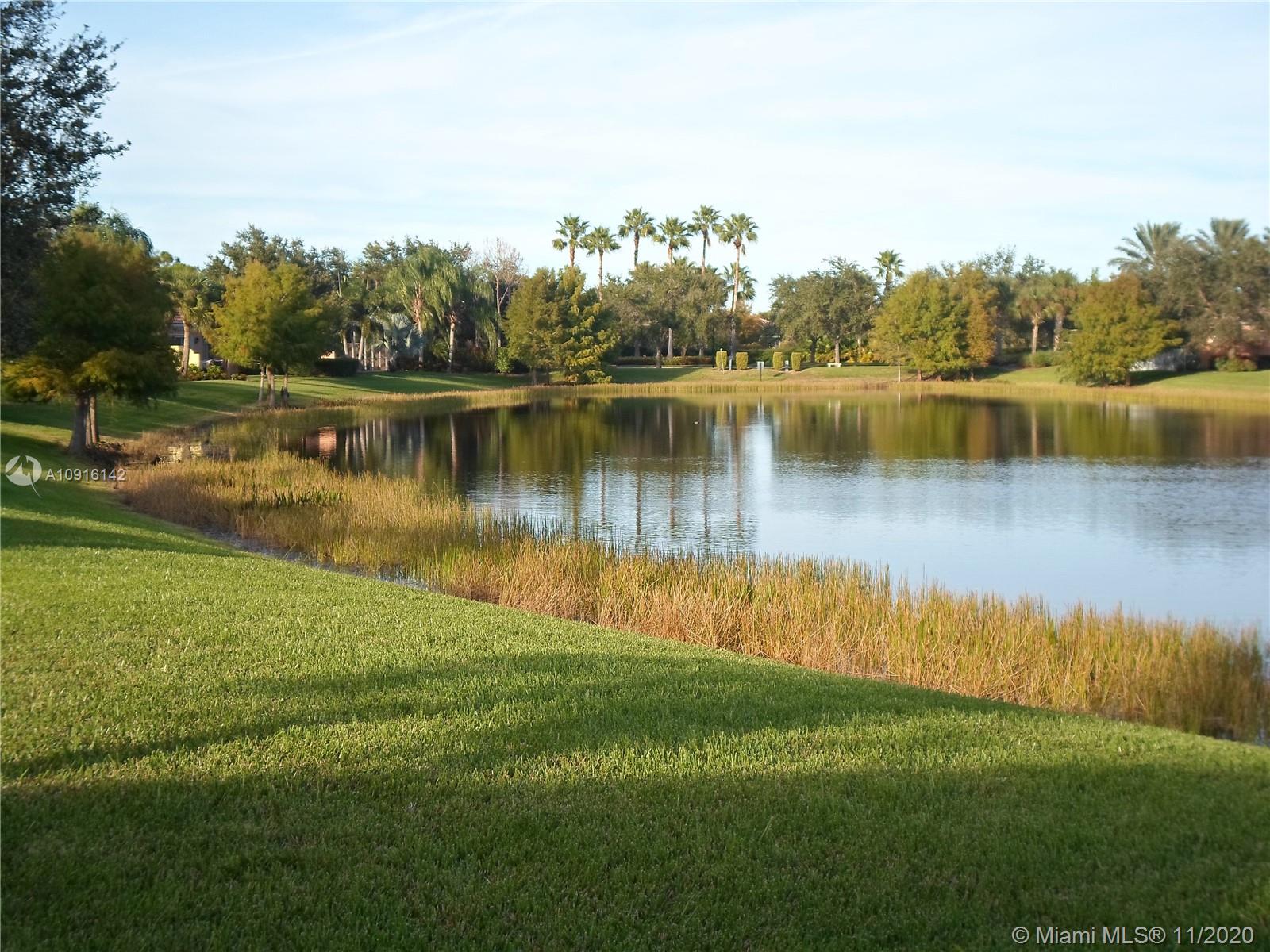 10889 Southwest Candlewood Road Port St. Lucie, FL 34987 - Photo 2 of 13 Lake View