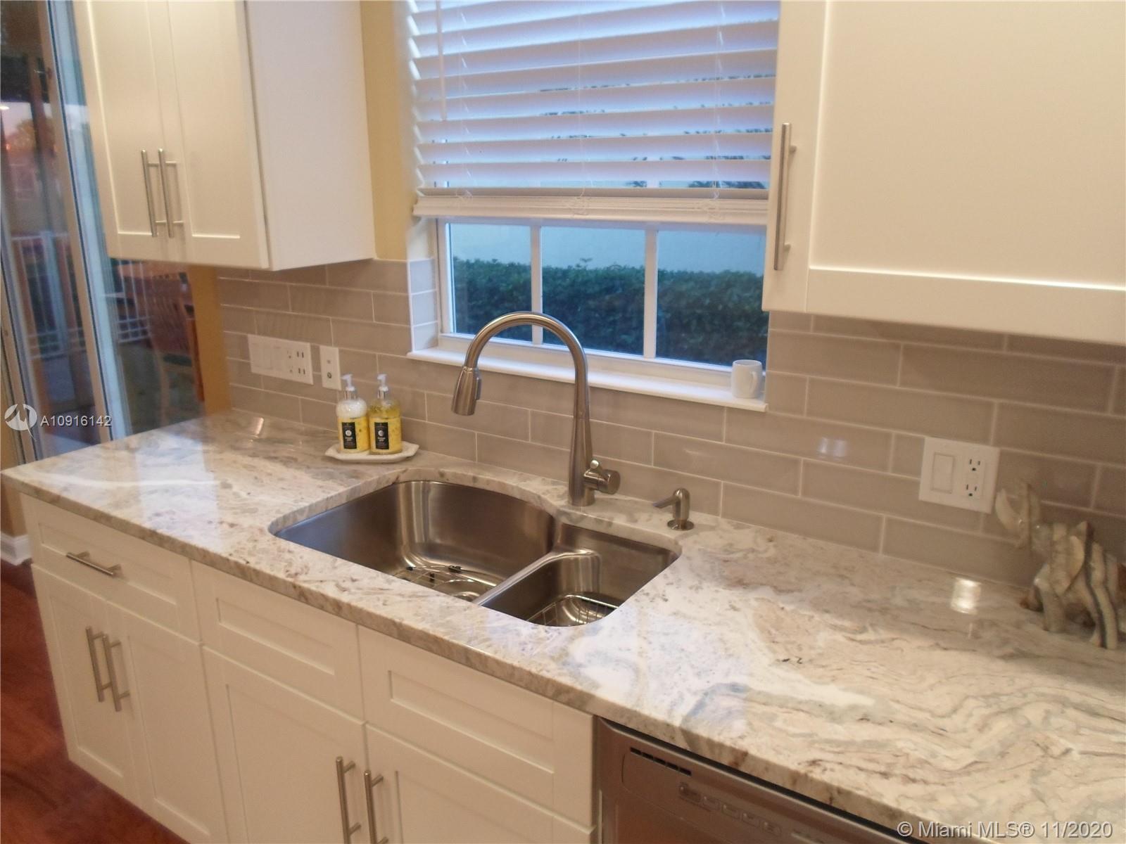 10889 Southwest Candlewood Road Port St. Lucie, FL 34987 - Photo 6 of 13 Beautiful Backsplash