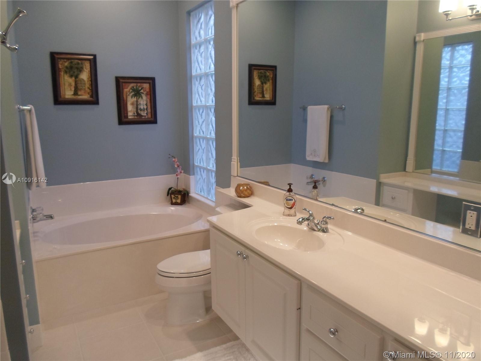 10889 Southwest Candlewood Road Port St. Lucie, FL 34987 - Photo 7 of 13 Master Bathroom w/ Garden Tub