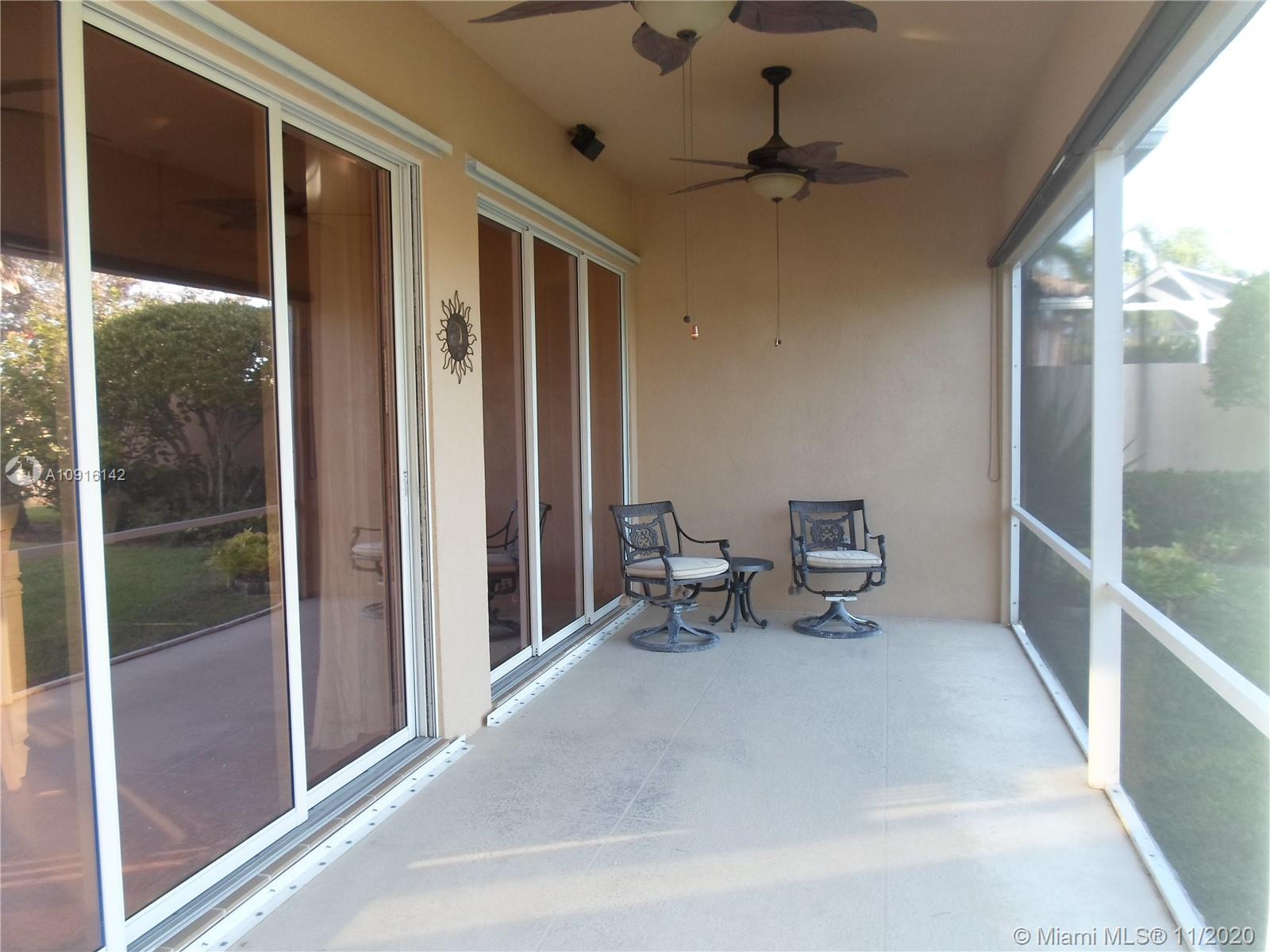 10889 Southwest Candlewood Road Port St. Lucie, FL 34987 - Photo 9 of 13 Screened Back Patio