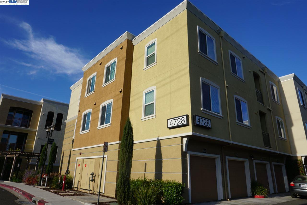 a front view of a building with a street