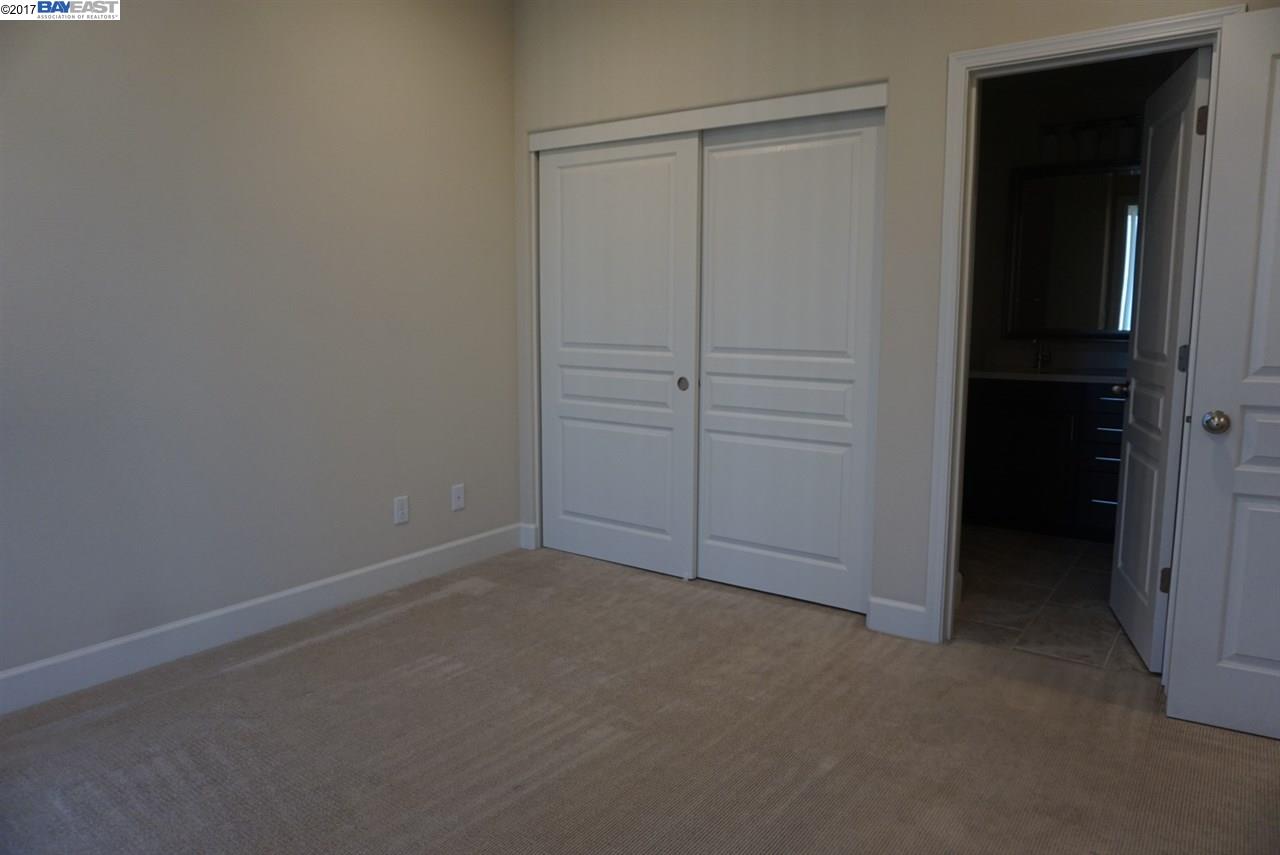 4728 Norris Canyon Road, Unit 205 San Ramon, CA 94583 - Photo 14 of 18 wooden floor and closet in a room