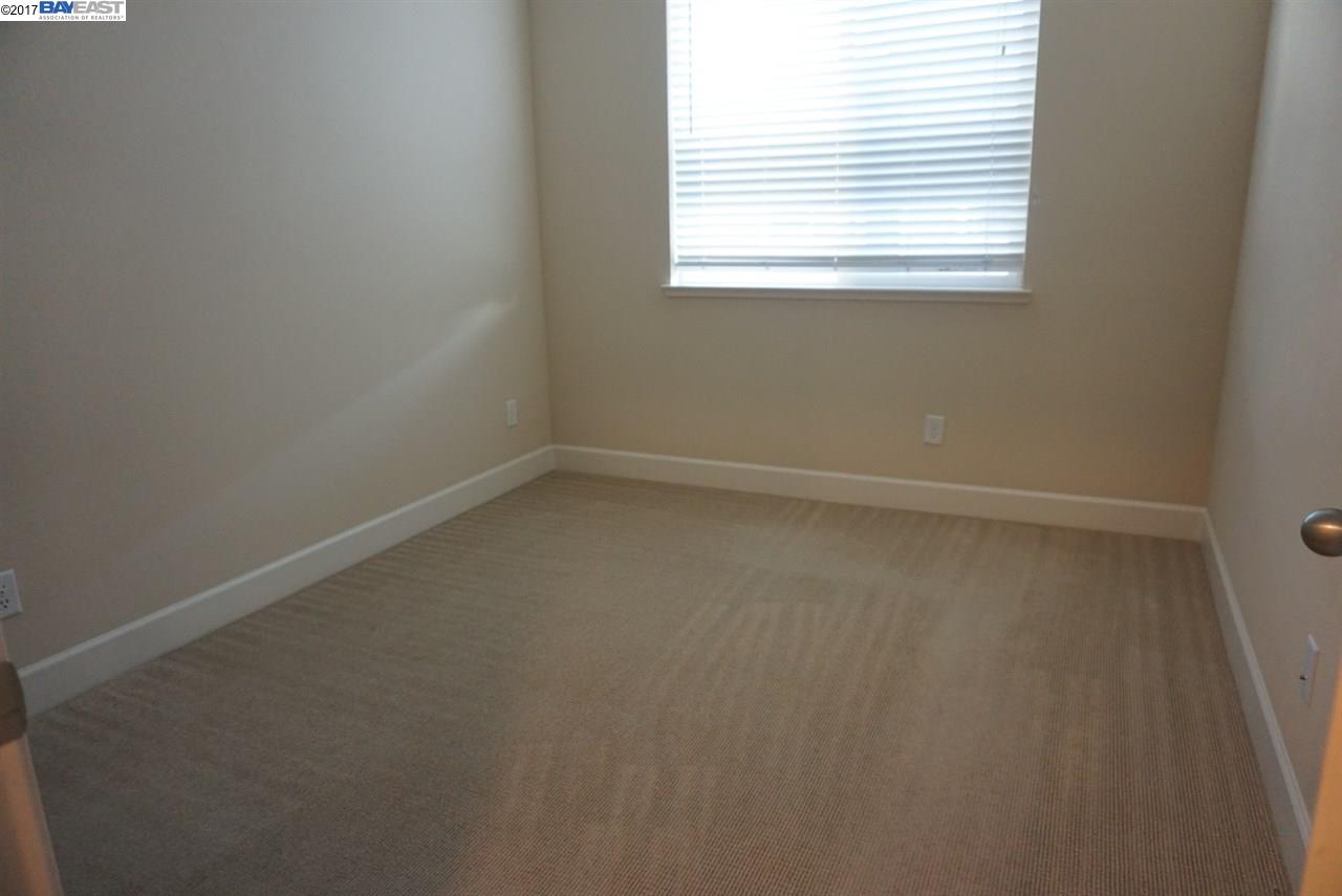4728 Norris Canyon Road, Unit 205 San Ramon, CA 94583 - Photo 10 of 18 an empty room with a window