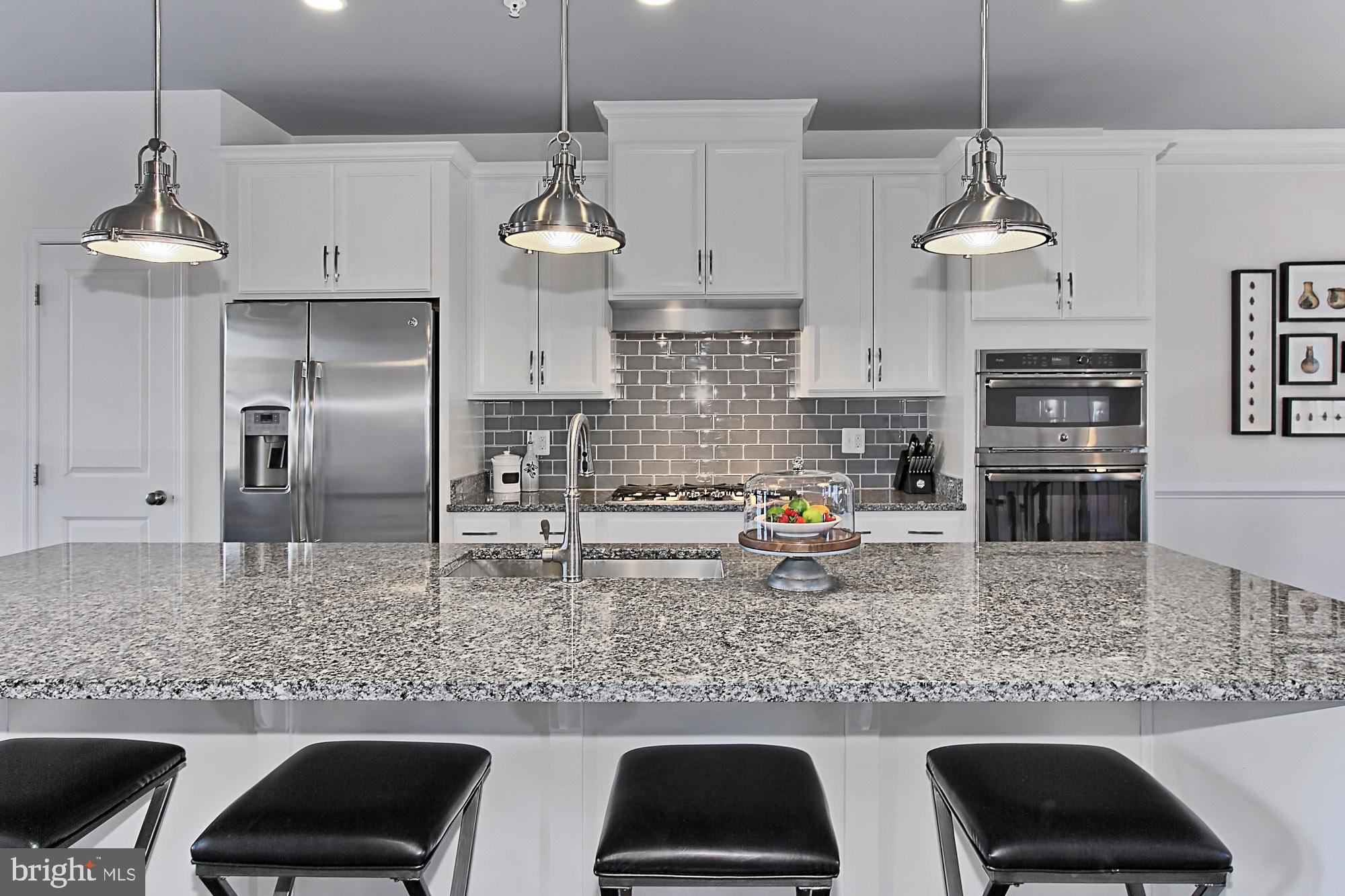 42645 Lancaster Ridge Terrace Chantilly, VA 20152 - Photo 14 of 39 Urban chic pendant lighting adds a loft feel