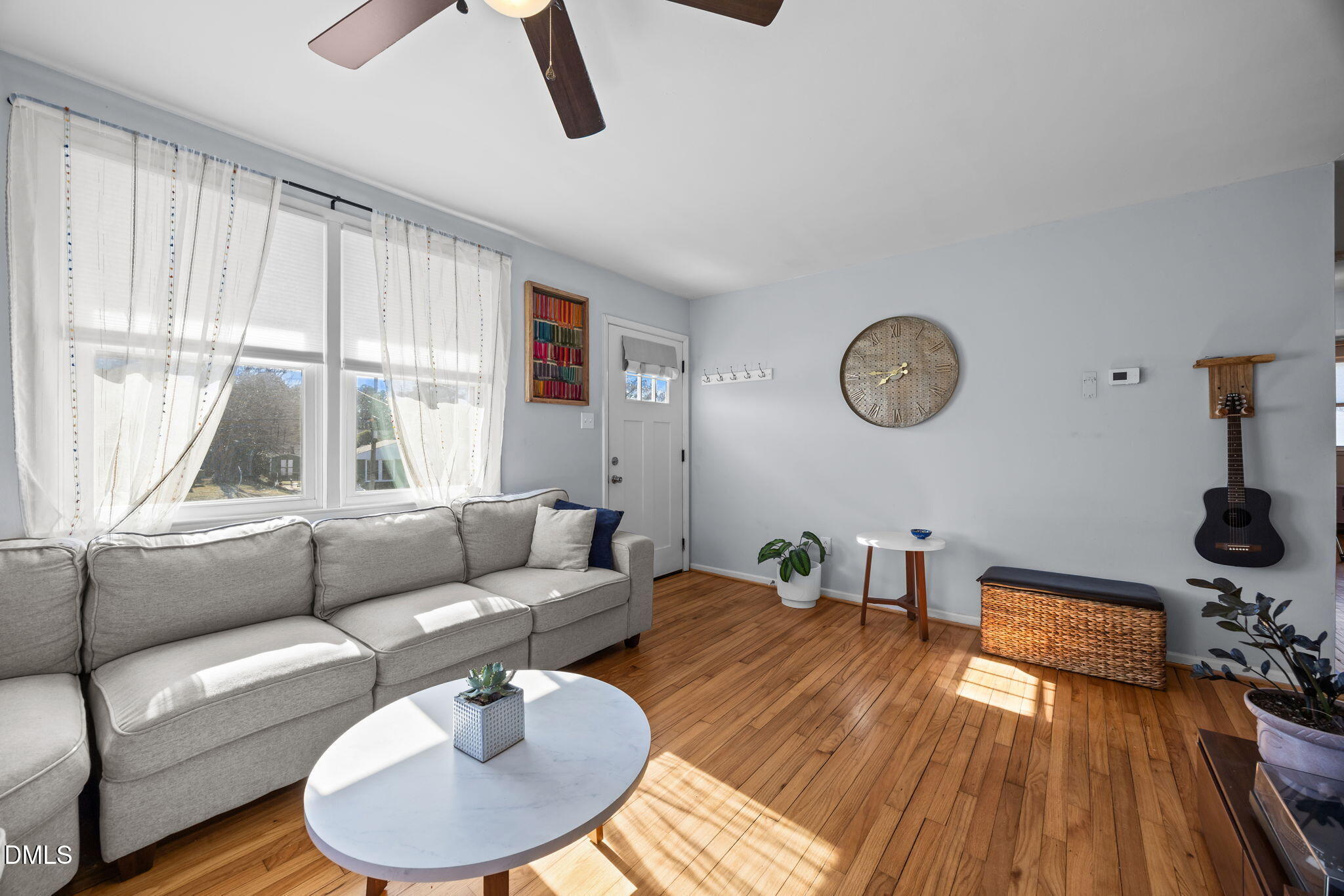 823 Hadley Road Raleigh, NC 27610 - Photo 25 of 35 a living room with furniture and a window