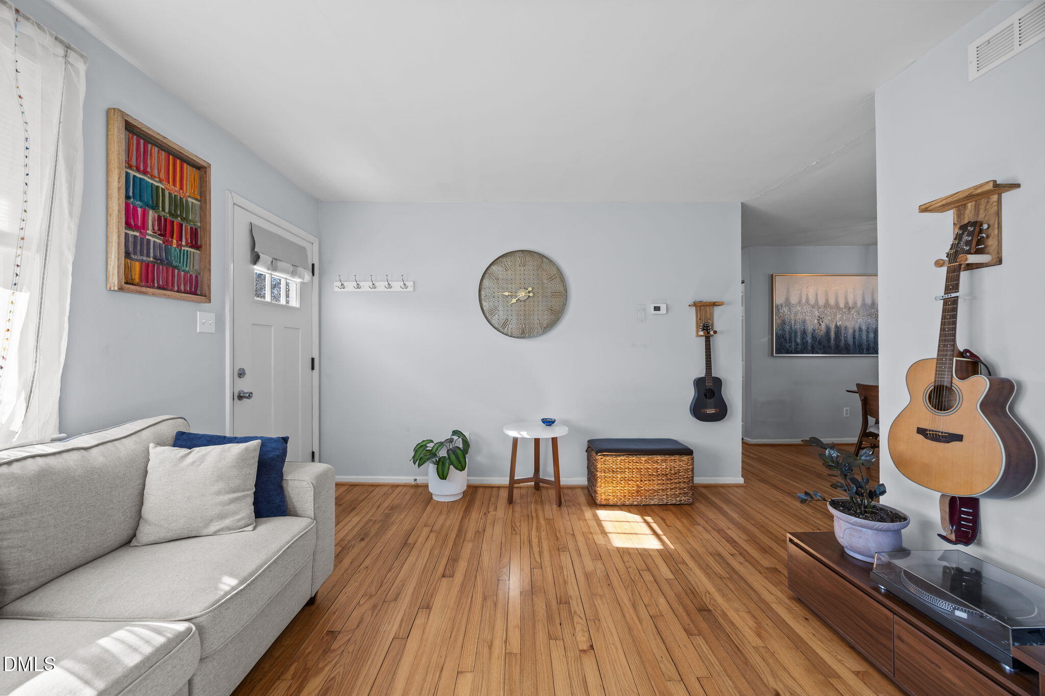 823 Hadley Road Raleigh, NC 27610 - Photo 26 of 35 a living room with furniture and wooden floor