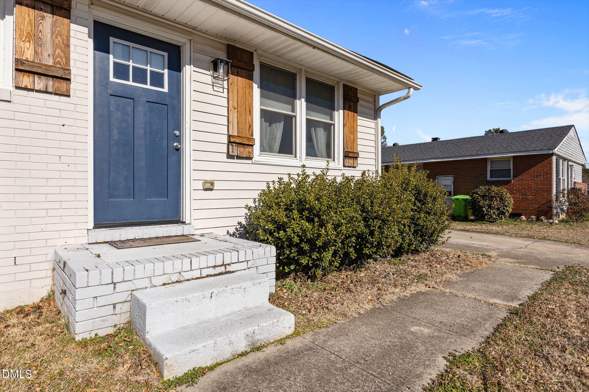 823 Hadley Road Raleigh, NC 27610 - Photo 29 of 35 a view of a backyard with plants and large tree