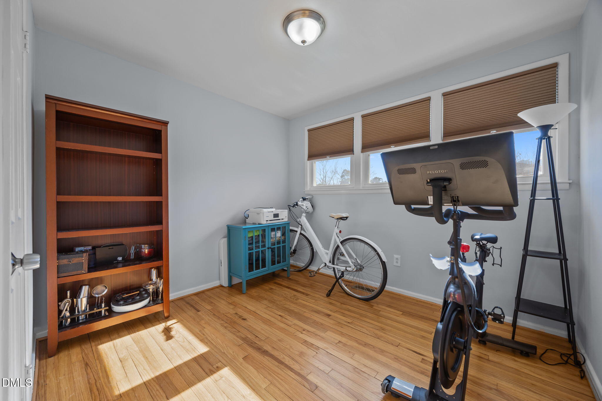 823 Hadley Road Raleigh, NC 27610 - Photo 8 of 35 a view of a room with gym equipment