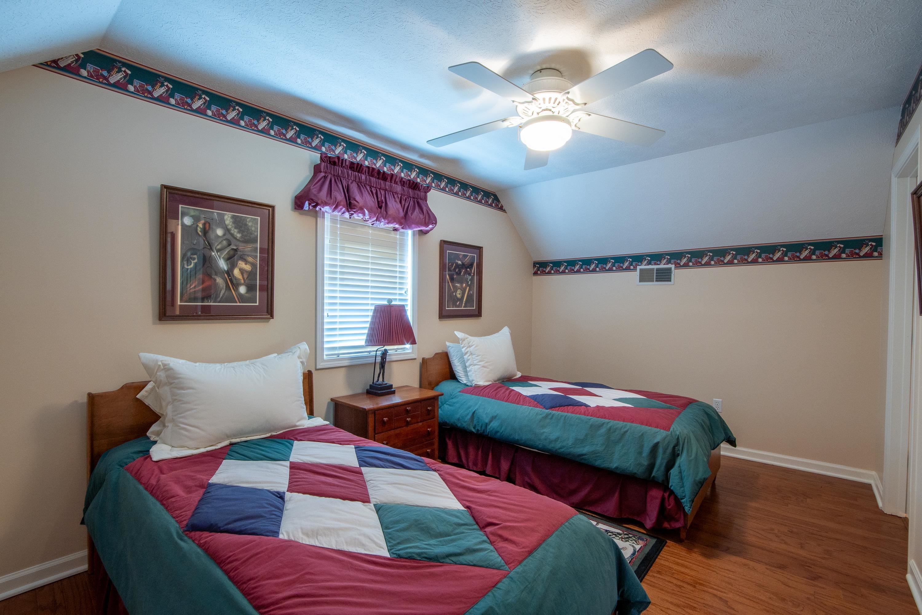 100 Vantage Pointe Counce, TN 38326 - Photo 21 of 33 a bedroom with furniture and a chandelier