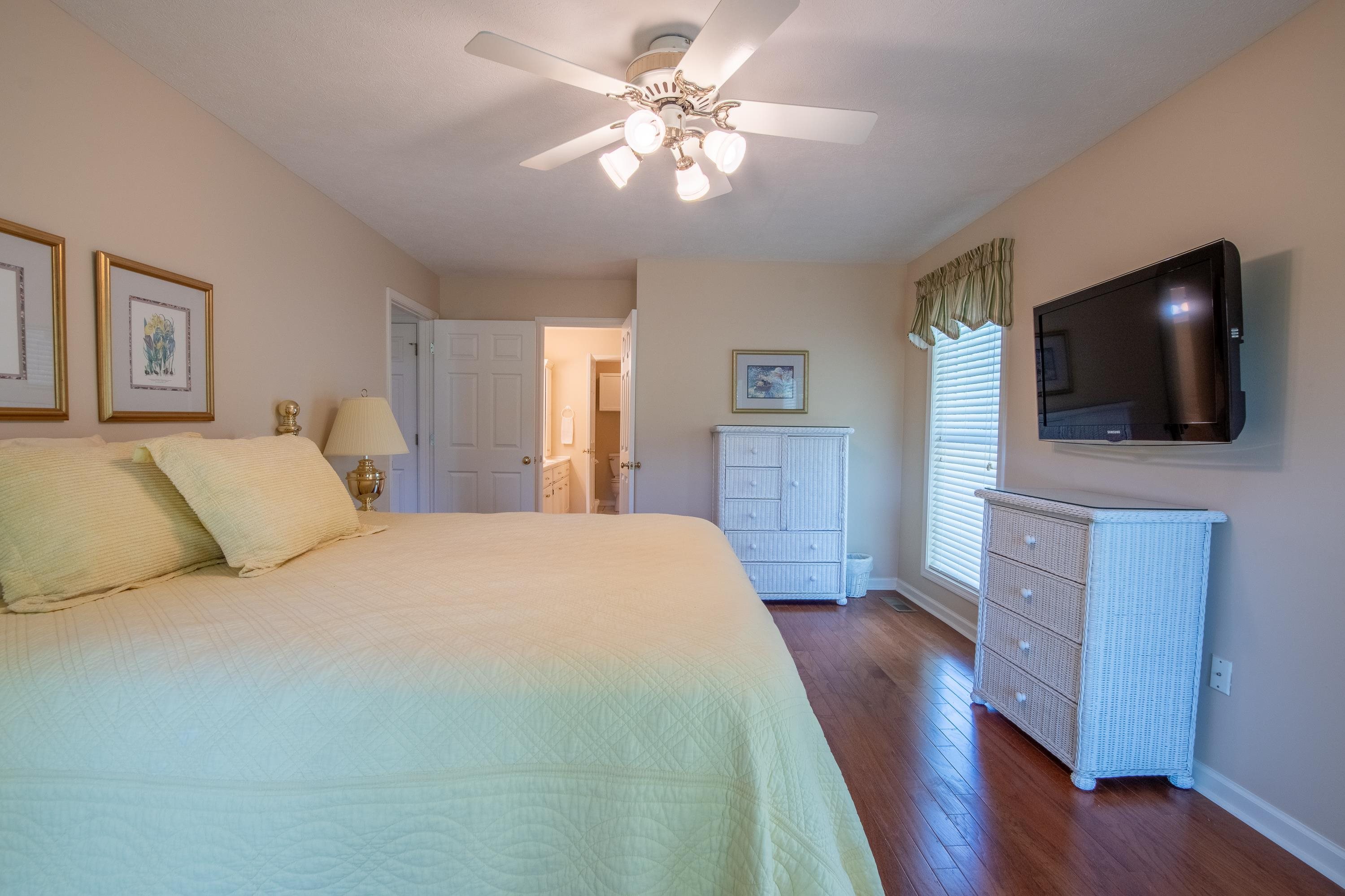 100 Vantage Pointe Counce, TN 38326 - Photo 29 of 33 a bedroom with a bed and a flat screen tv