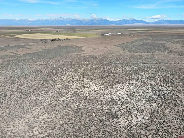 a view of an ocean and a mountain