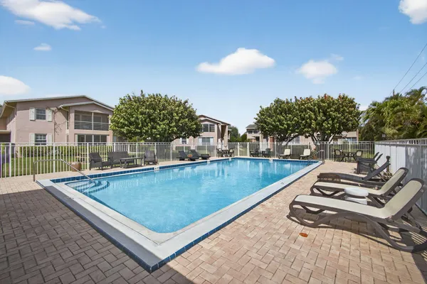 a view of a swimming pool with a terrace