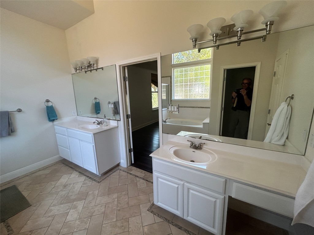 6705 Fort Davis Cove, Unit A Austin, TX 78731 - Photo 15 of 23 Master Bathroom with his/her areas