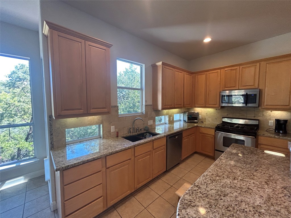 6705 Fort Davis Cove, Unit A Austin, TX 78731 - Photo 8 of 23 Island Kitchen w Granite countertops