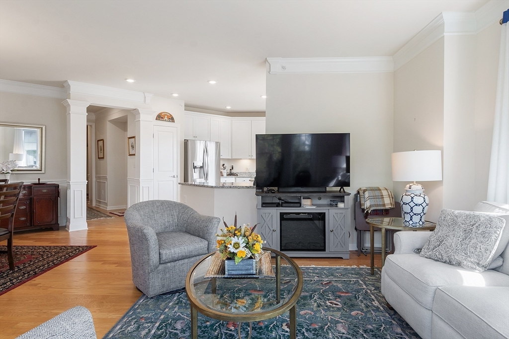 2 Francis Drive, Unit 412 Andover, MA 01810 - Photo 13 of 33 a living room with furniture and a flat screen tv