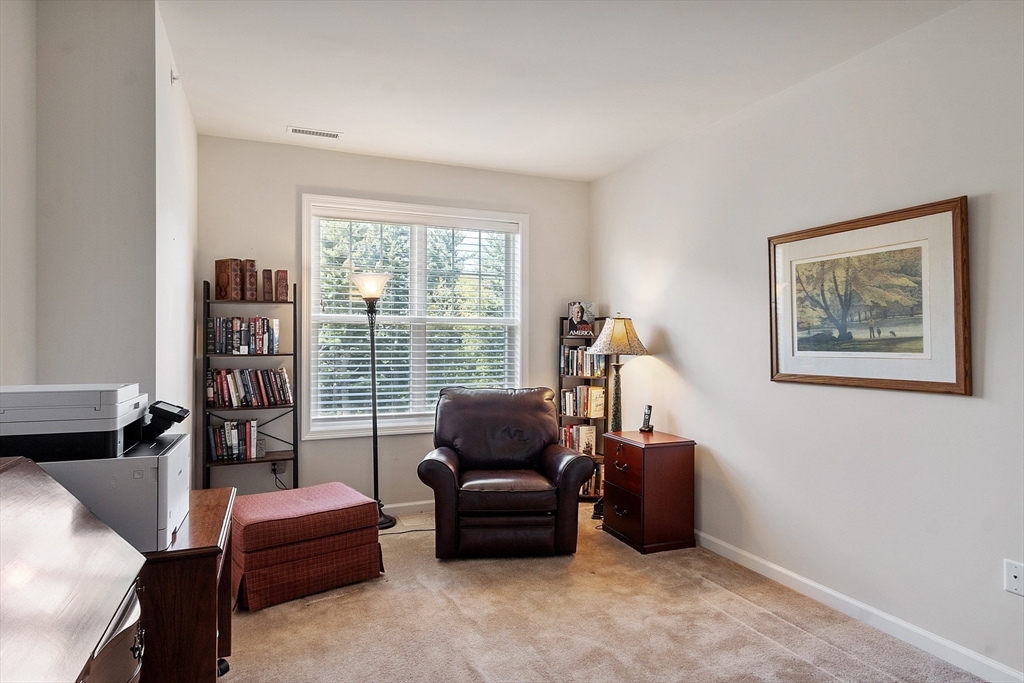 2 Francis Drive, Unit 412 Andover, MA 01810 - Photo 19 of 33 a living room with furniture and a large window