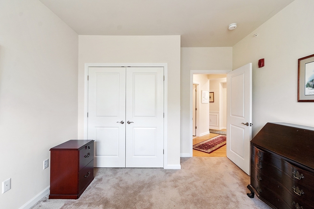 2 Francis Drive, Unit 412 Andover, MA 01810 - Photo 20 of 33 a living room with furniture