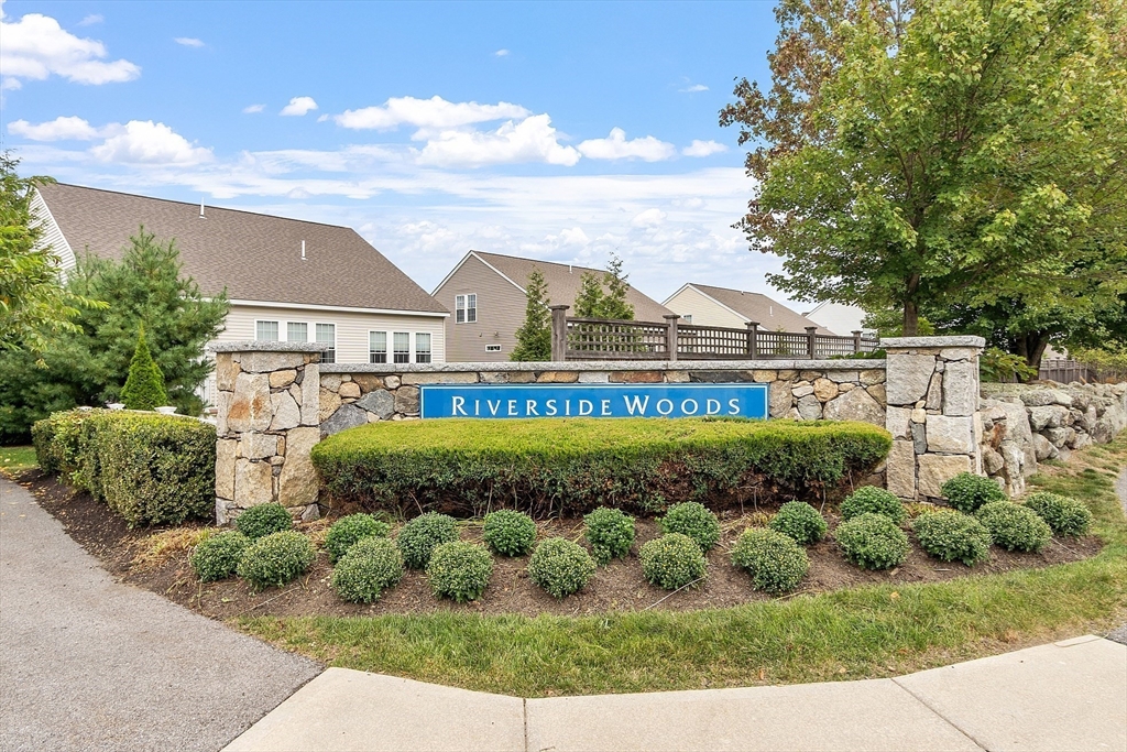 2 Francis Drive, Unit 412 Andover, MA 01810 - Photo 24 of 33 a front view of a house with a yard