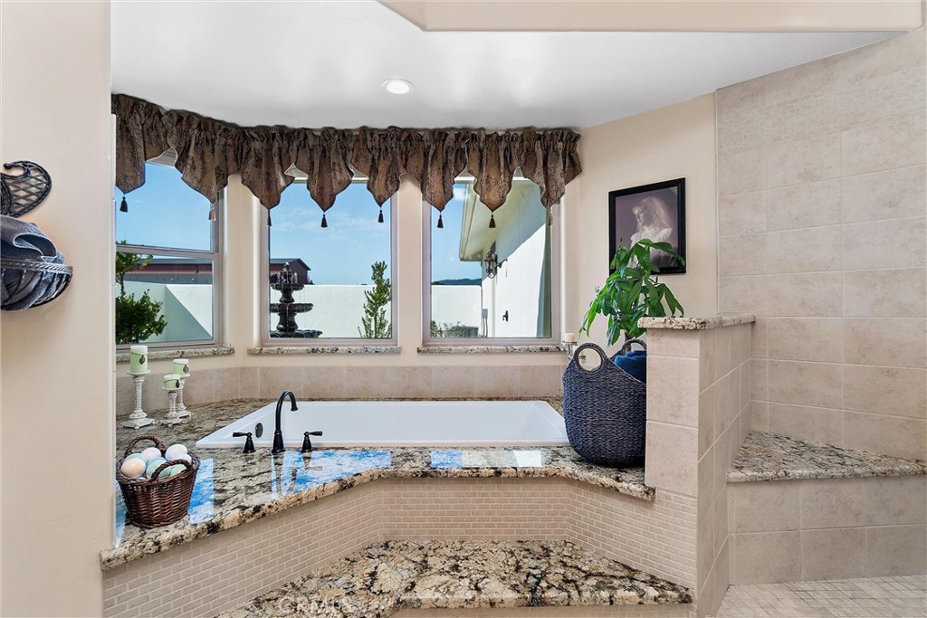 18205 Walnut Avenue Atascadero, CA 93422 - Photo 17 of 46 a living room with furniture and a potted plant