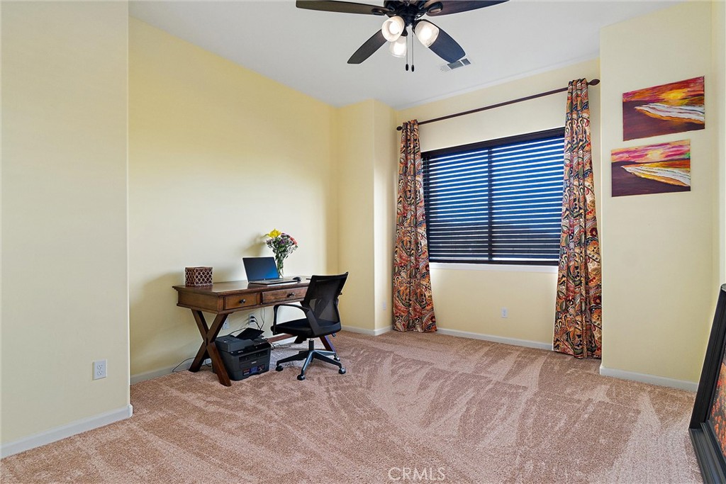 18205 Walnut Avenue Atascadero, CA 93422 - Photo 21 of 46 a workspace with furniture and a window