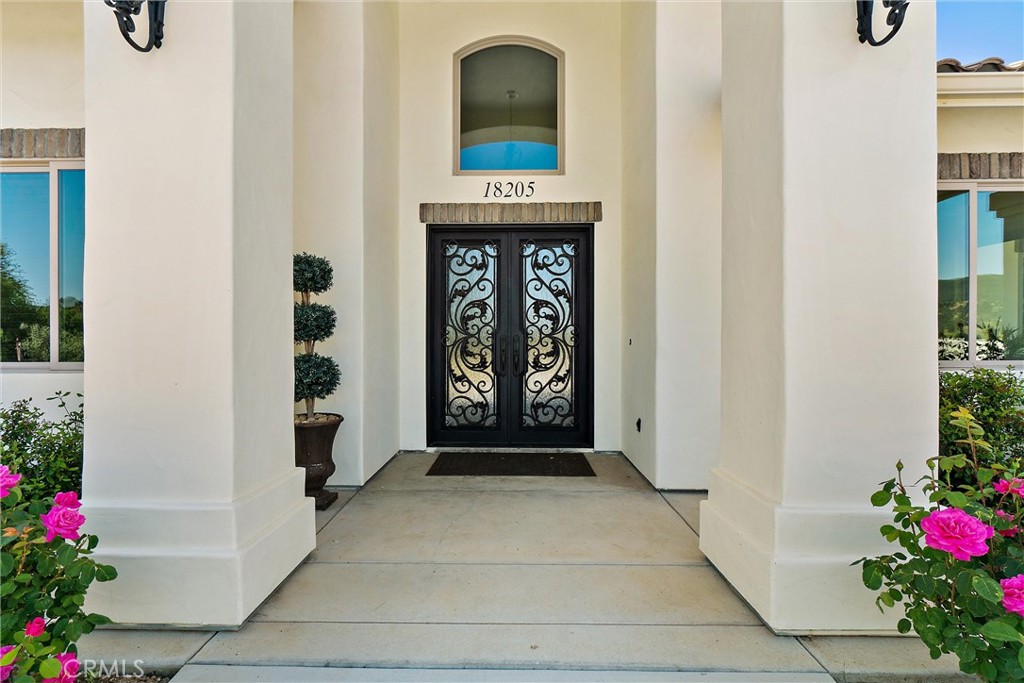 18205 Walnut Avenue Atascadero, CA 93422 - Photo 3 of 46 a view of a entryway door of the house