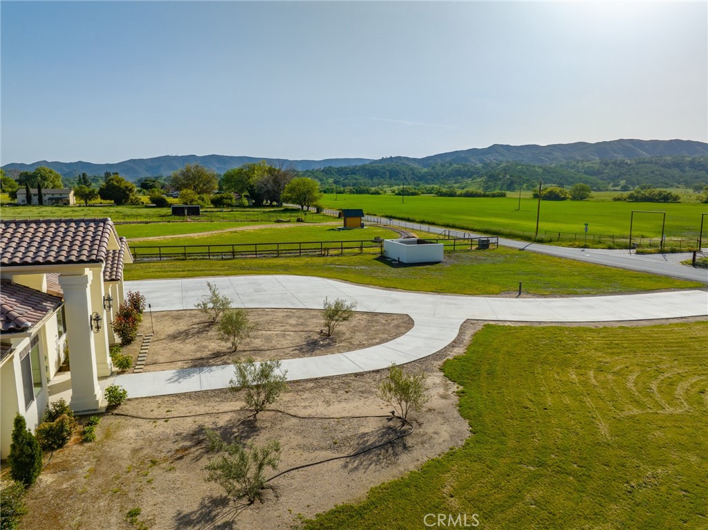 18205 Walnut Avenue Atascadero, CA 93422 - Photo 46 of 46 a view of a swimming pool with a yard and green space