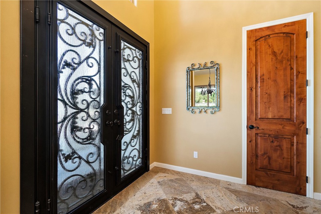 18205 Walnut Avenue Atascadero, CA 93422 - Photo 5 of 46 a view of a entryway door front of a house