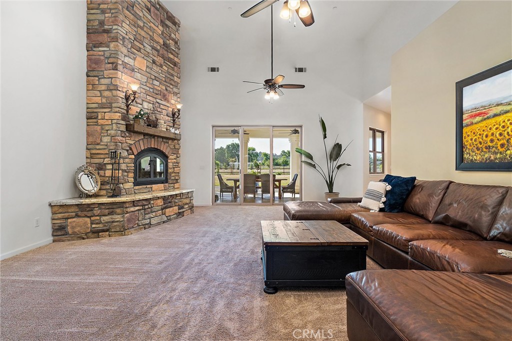 18205 Walnut Avenue Atascadero, CA 93422 - Photo 6 of 46 a living room with furniture and a fireplace