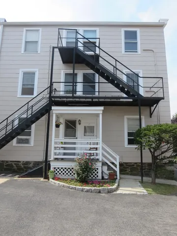 front view of a house with a street
