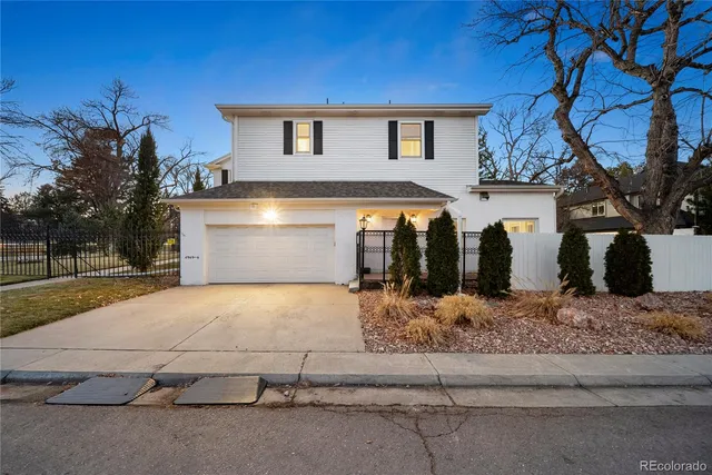 a front view of a house with garage