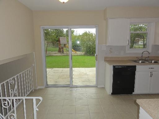 625 Wolf Road Matteson, IL 60443 - Photo 4 of 15 a kitchen with a sink and a large window