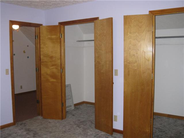 950 Woodhaven Road Lyles, TN 37098 - Photo 12 of 20 The bedrooms are carpeted and have lighted ceiling fans. They are very roomy at 12x12 and the closets in both rooms are quite large: 4 1/2 'x 12' !