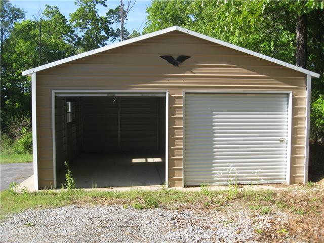950 Woodhaven Road Lyles, TN 37098 - Photo 17 of 20 Detached two car garage was added to the property in 2010 . There is also an additional storage shed to hold all your tools etc...