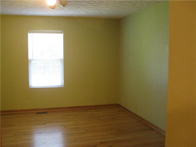 950 Woodhaven Road Lyles, TN 37098 - Photo 8 of 20 Master bedroom is 16 x13 and is on the main level, has beautiful Oak hardwood floors installed in 2010,
