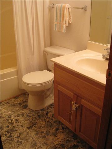 950 Woodhaven Road Lyles, TN 37098 - Photo 10 of 20 The second floor full bath is shared by both bedrooms.