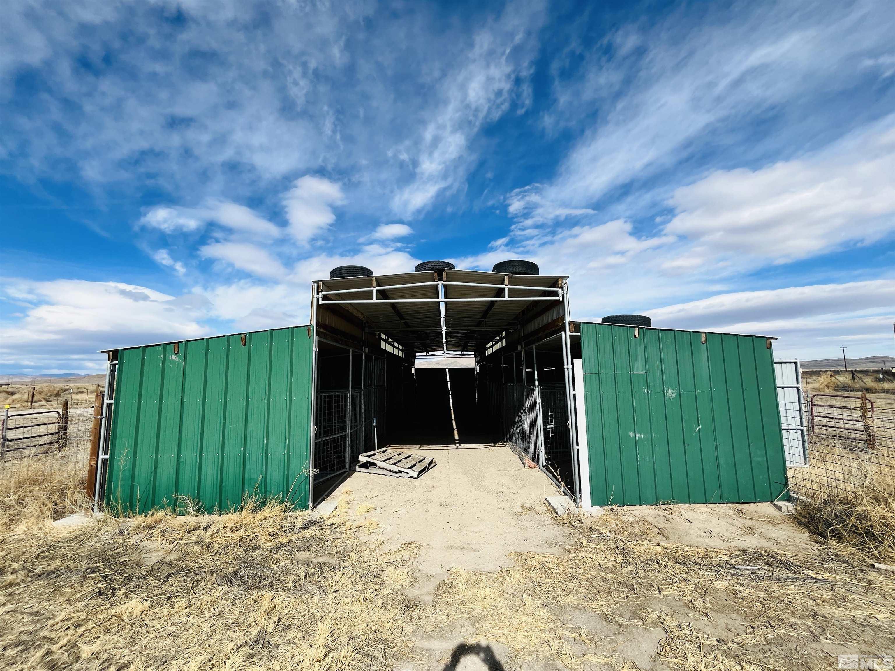 249 Us Highway 95a North Yerington, NV 89447 - Photo 13 of 24 a view of backyard with cabin