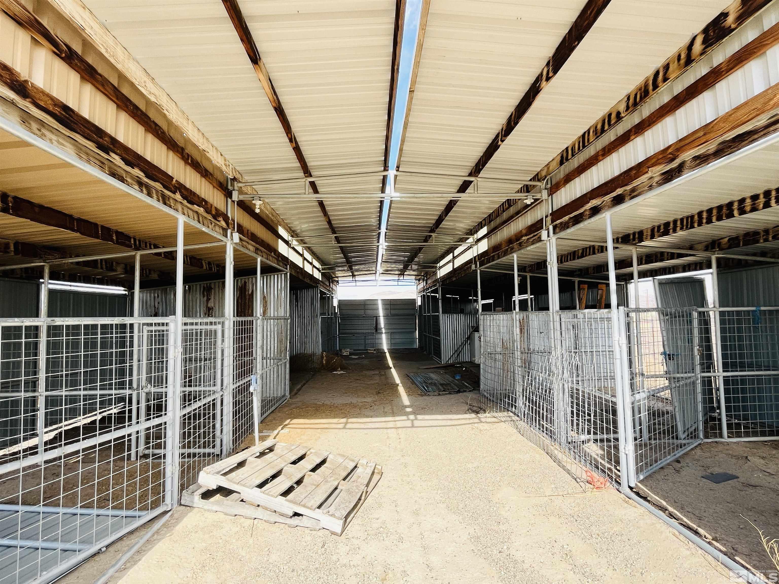 249 Us Highway 95a North Yerington, NV 89447 - Photo 14 of 24 a view of porch with wooden stairs and a glass door