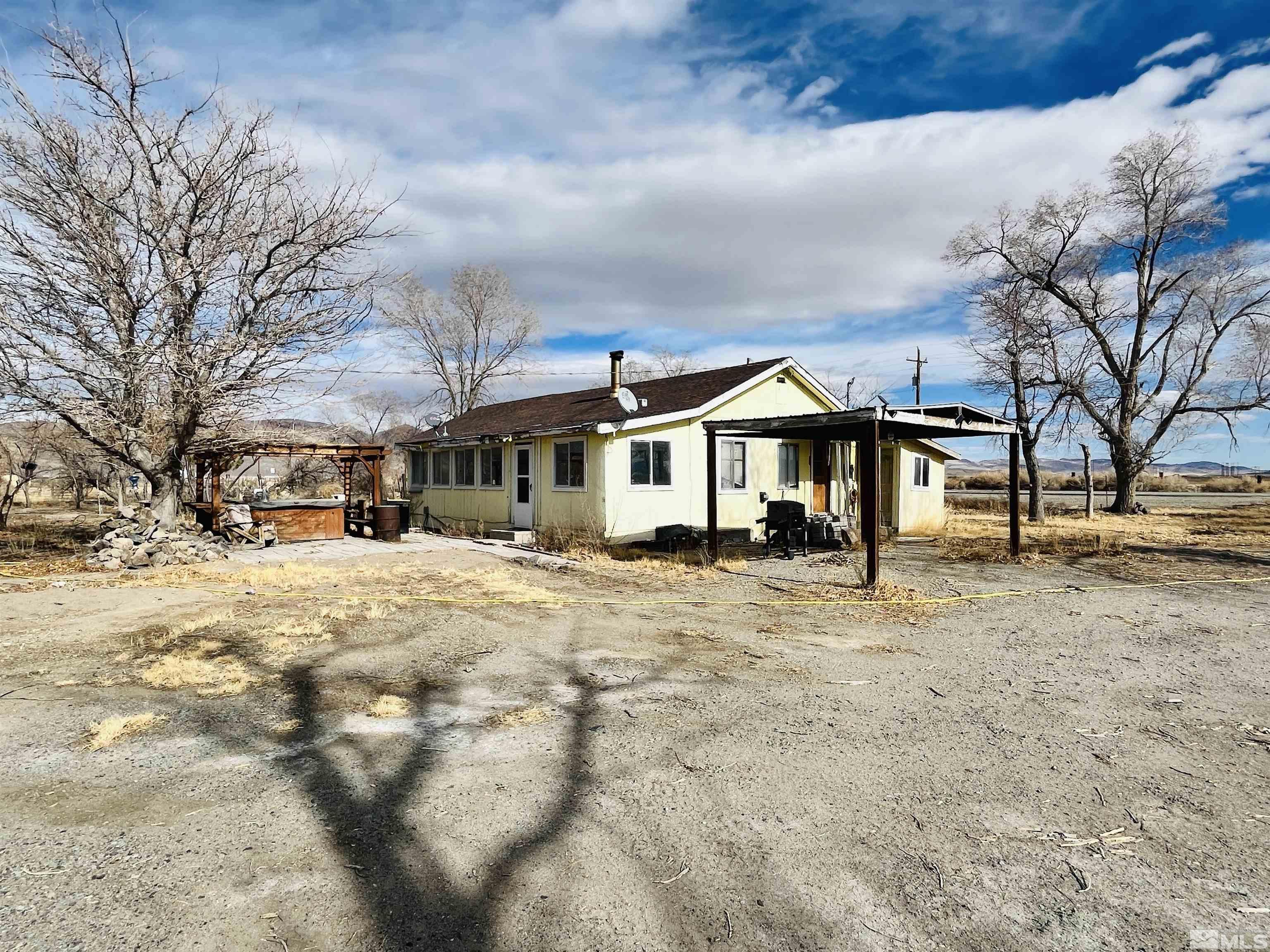 249 Us Highway 95a North Yerington, NV 89447 - Photo 22 of 24 a front view of a house with a yard