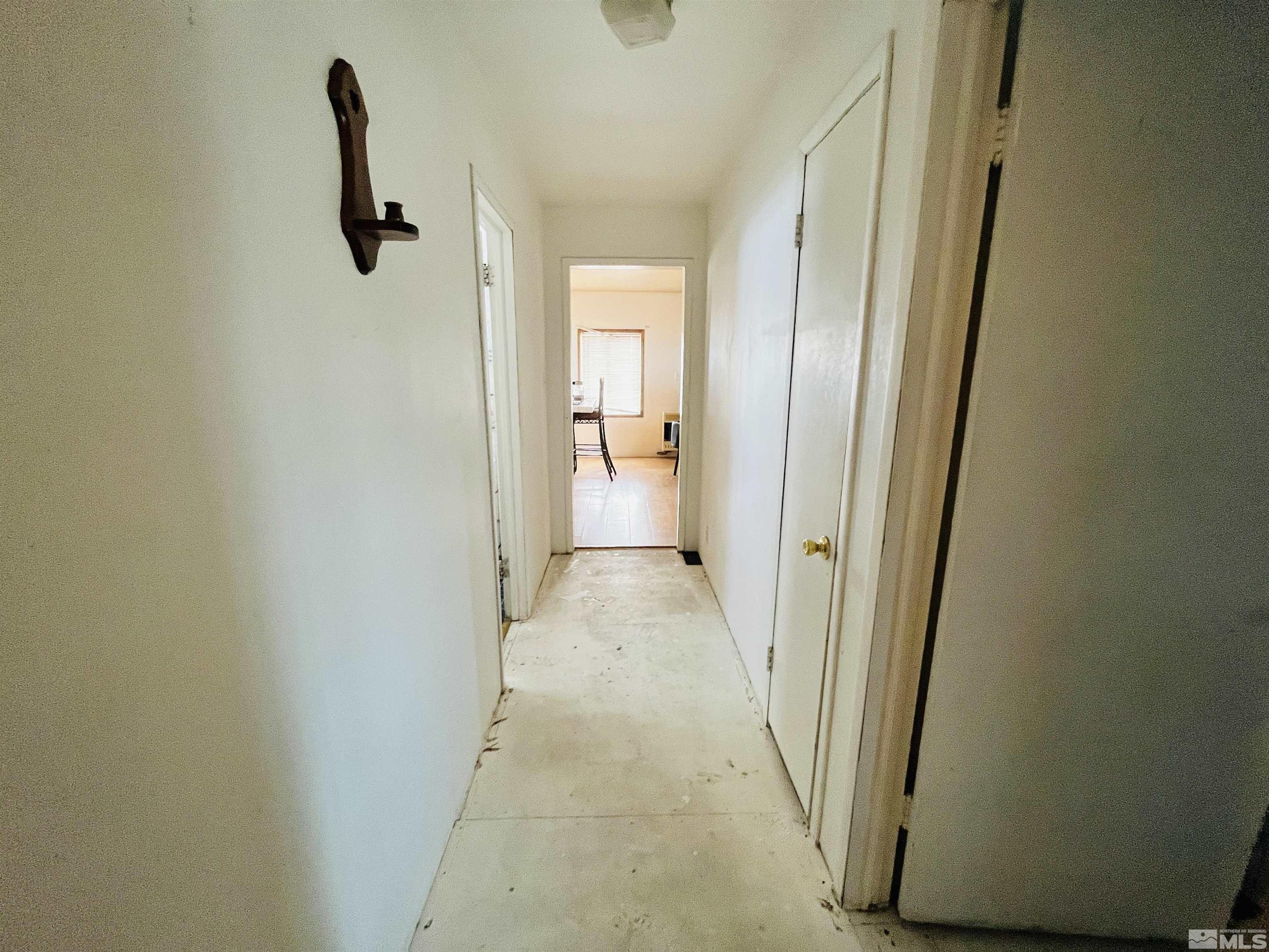 249 Us Highway 95a North Yerington, NV 89447 - Photo 5 of 24 a view of a bathroom from a corridor