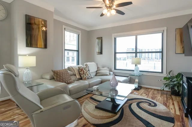 a living room with furniture and window